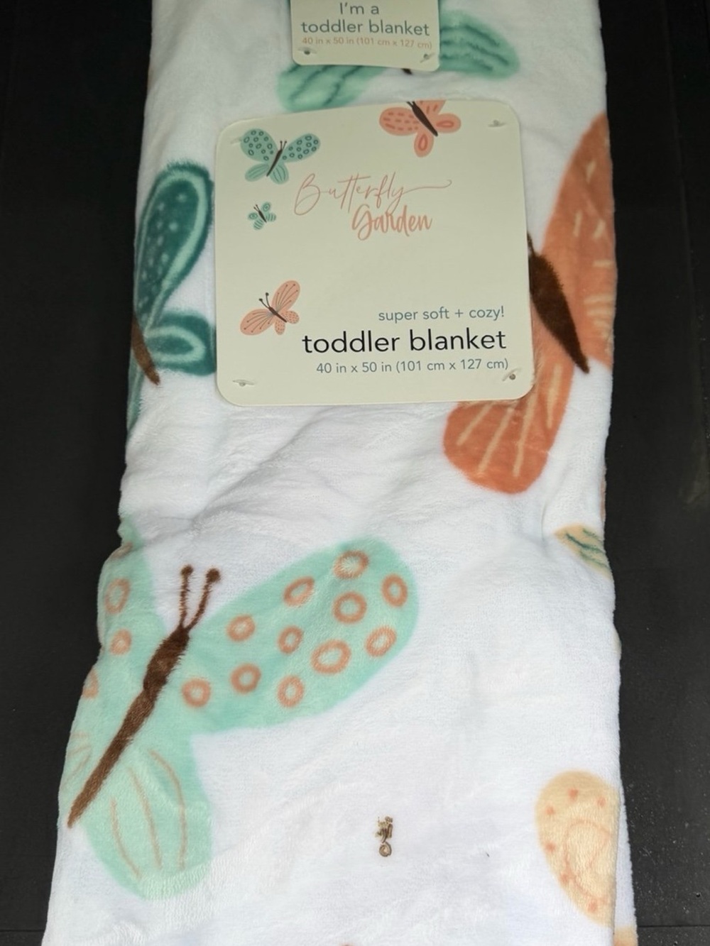 & Other Stories White Toddler Blanket with Mint and Peach Butterflies
